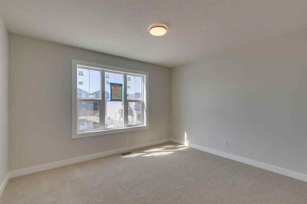 MLS® A2264277 - 92 Amblefield Grove NW in Moraine Calgary, Residential