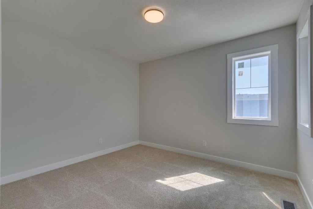 MLS® A2264277 - 92 Amblefield Grove NW in Moraine Calgary, Residential