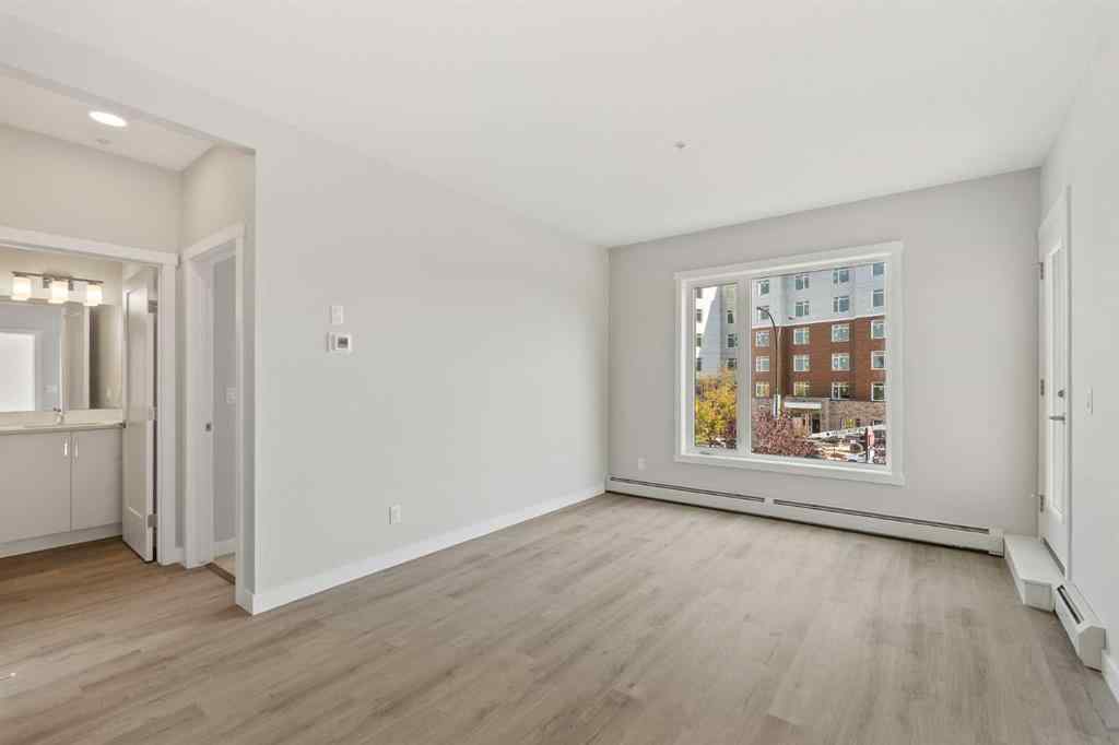 MLS® A2264283 - Unit #203 700 Shawnee Square SW in Shawnee Slopes Calgary, Residential