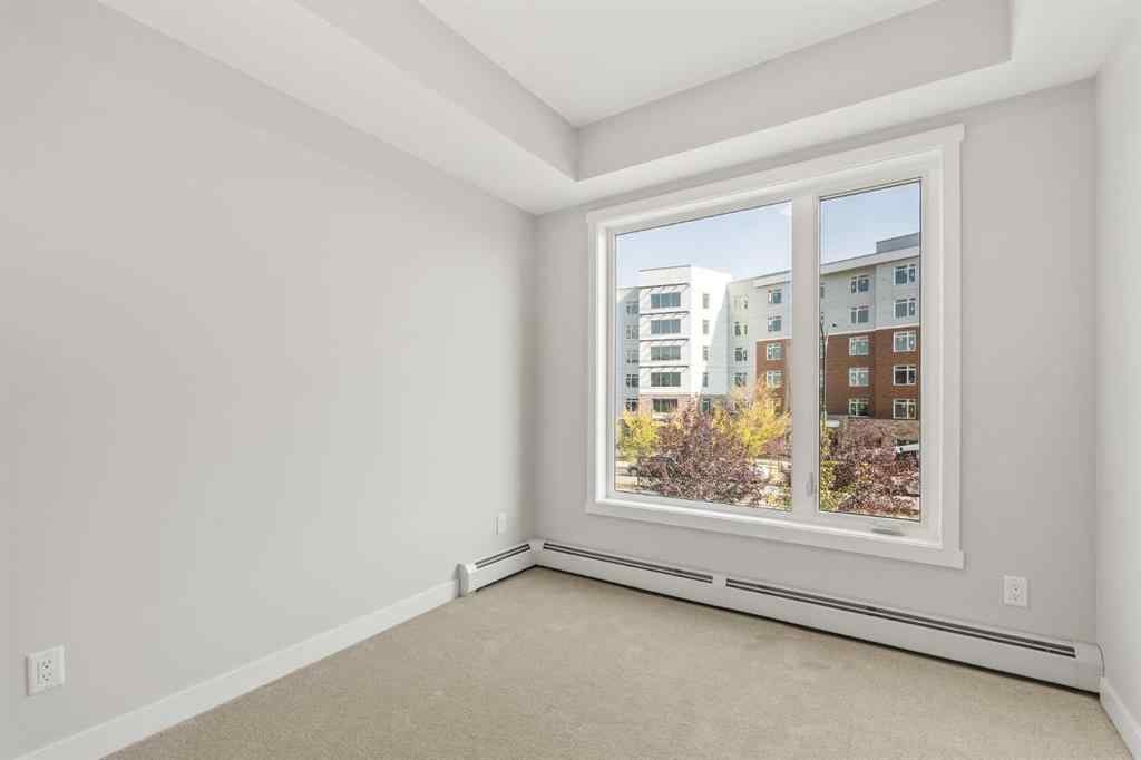 MLS® A2264283 - Unit #203 700 Shawnee Square SW in Shawnee Slopes Calgary, Residential