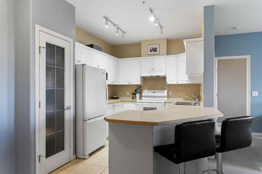 MLS® A2264285 - Unit #1320 1320 Lake Fraser Green SE in Lake Bonavista Calgary, Residential