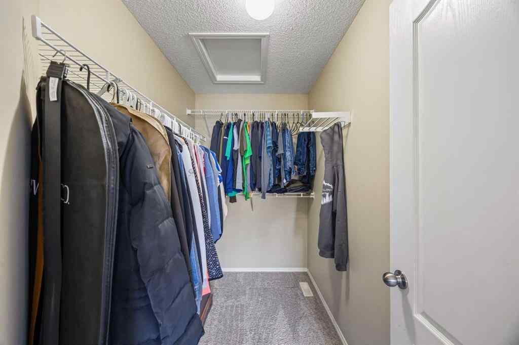 MLS® A2264302 - 303 Westmount Court  in Westridge Okotoks, Residential