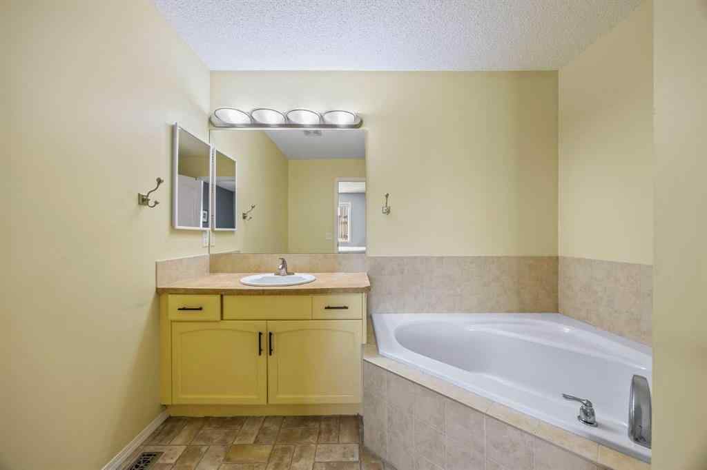 MLS® A2264302 - 303 Westmount Court  in Westridge Okotoks, Residential