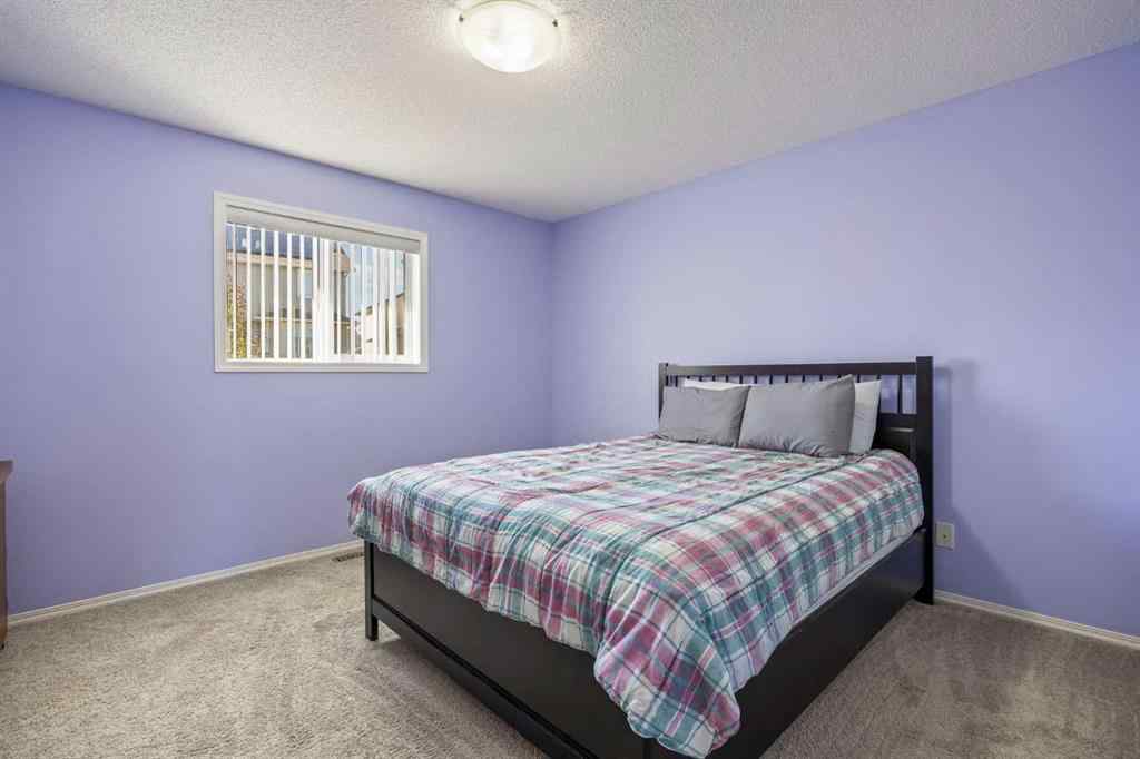 MLS® A2264302 - 303 Westmount Court  in Westridge Okotoks, Residential