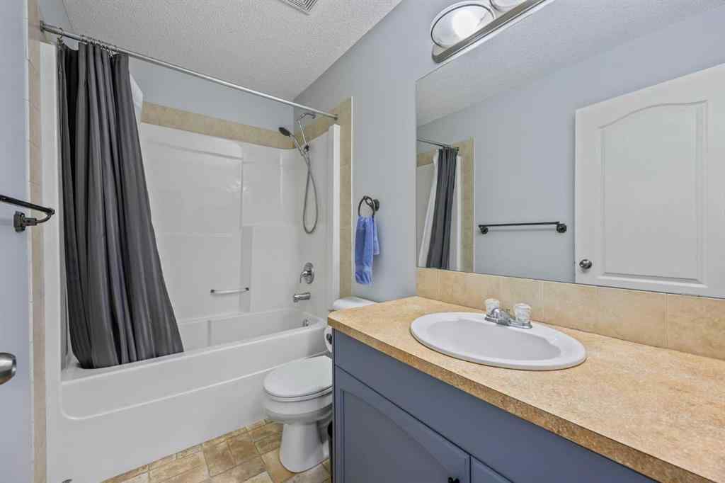 MLS® A2264302 - 303 Westmount Court  in Westridge Okotoks, Residential