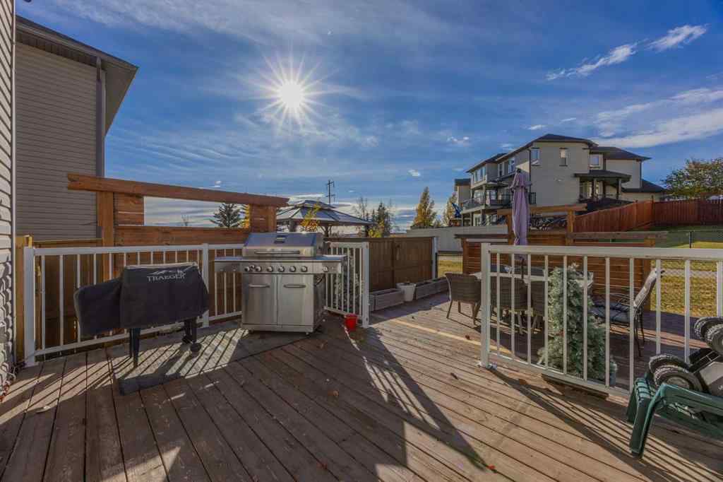 MLS® A2264302 - 303 Westmount Court  in Westridge Okotoks, Residential