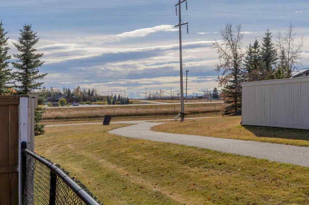 MLS® A2264302 - 303 Westmount Court  in Westridge Okotoks, Residential