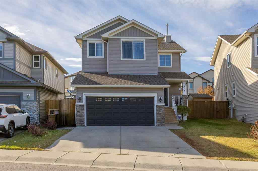 MLS® A2264302 - 303 Westmount Court  in Westridge Okotoks, Residential