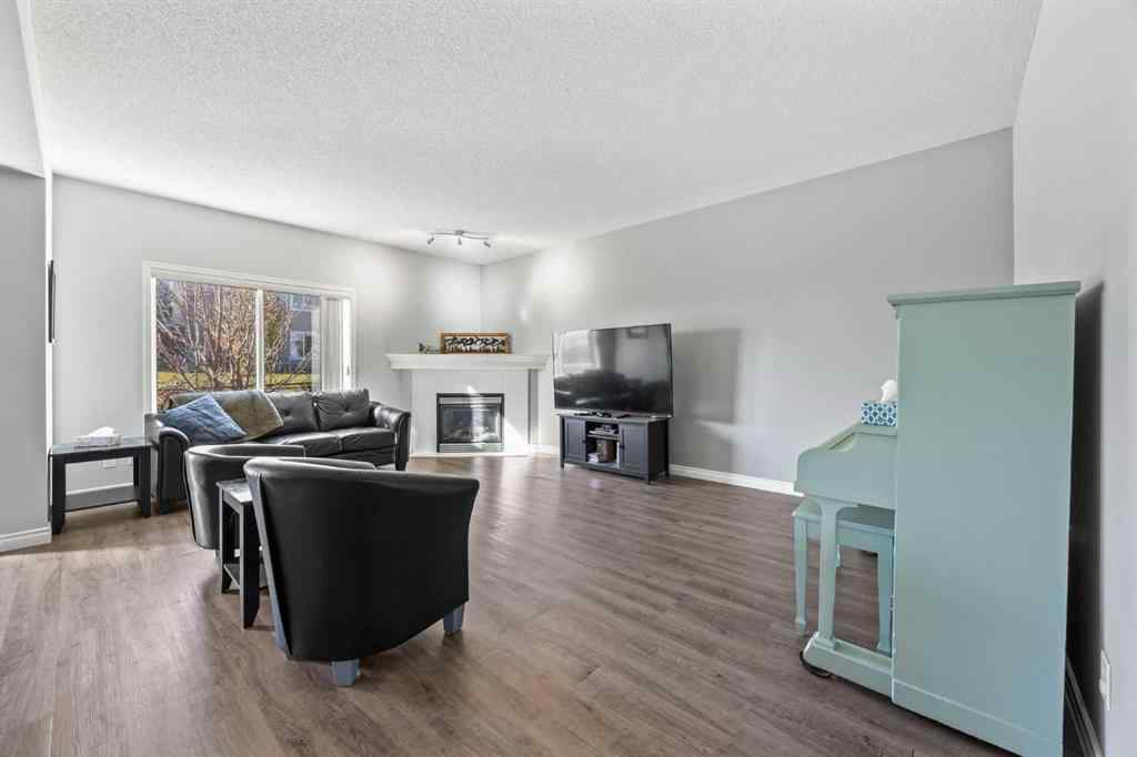 MLS® A2264302 - 303 Westmount Court  in Westridge Okotoks, Residential