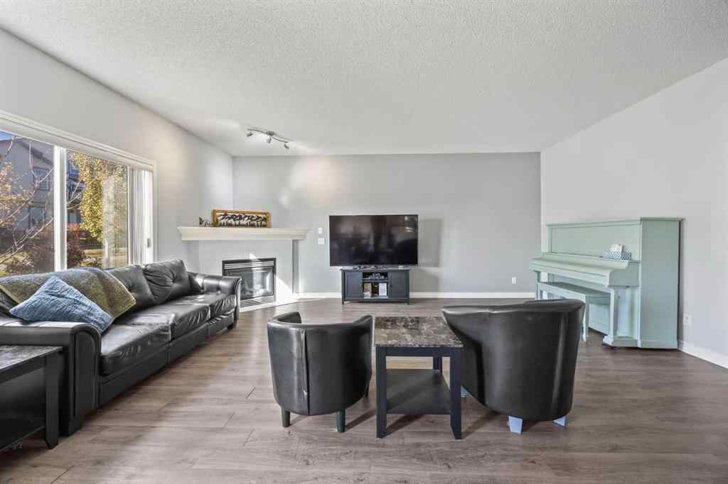 MLS® A2264302 - 303 Westmount Court  in Westridge Okotoks, Residential