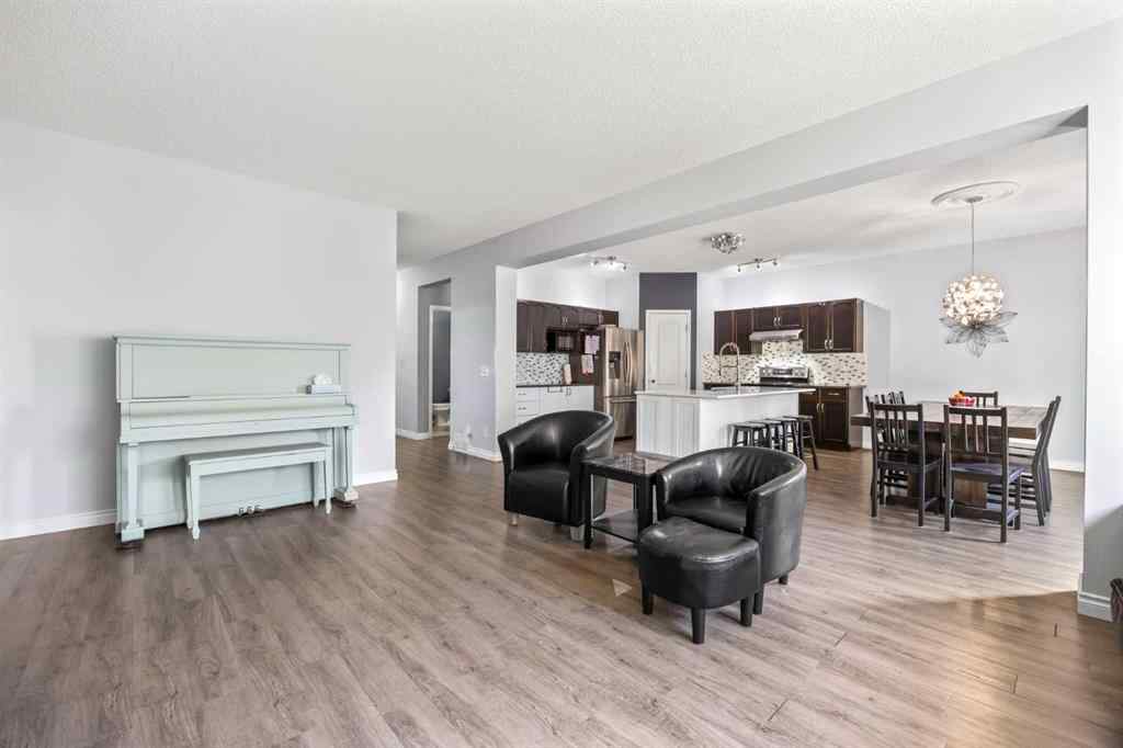 MLS® A2264302 - 303 Westmount Court  in Westridge Okotoks, Residential