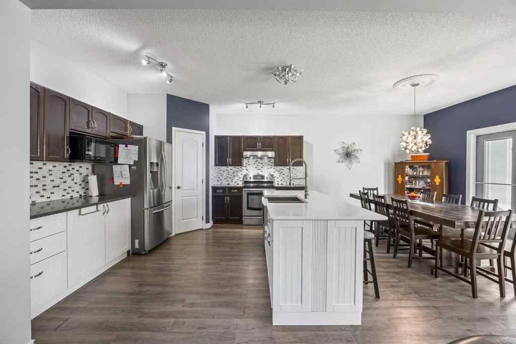 MLS® A2264302 - 303 Westmount Court  in Westridge Okotoks, Residential