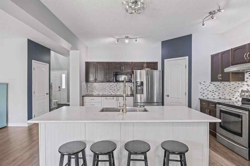 MLS® A2264302 - 303 Westmount Court  in Westridge Okotoks, Residential