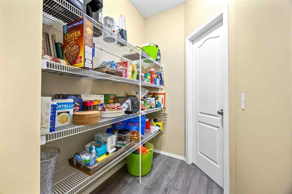 MLS® A2264302 - 303 Westmount Court  in Westridge Okotoks, Residential