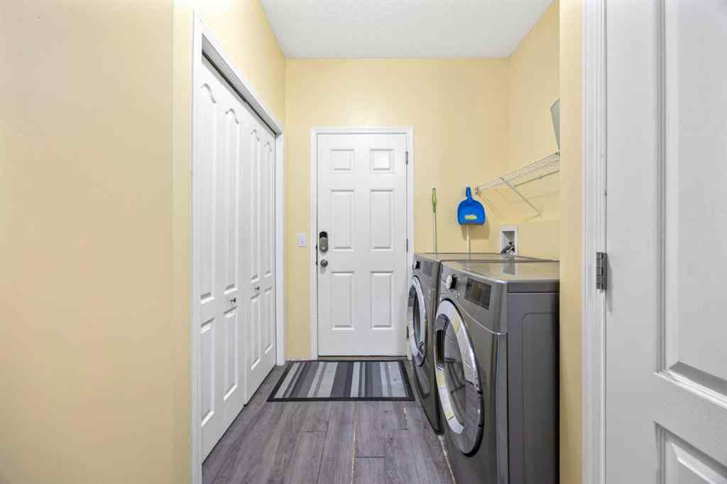 MLS® A2264302 - 303 Westmount Court  in Westridge Okotoks, Residential