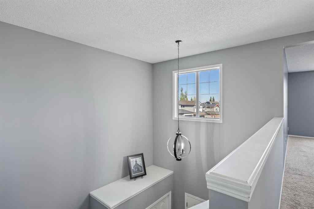 MLS® A2264302 - 303 Westmount Court  in Westridge Okotoks, Residential