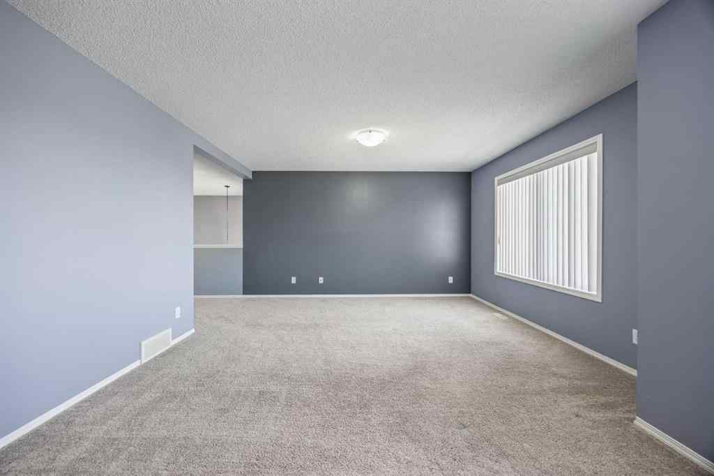 MLS® A2264302 - 303 Westmount Court  in Westridge Okotoks, Residential