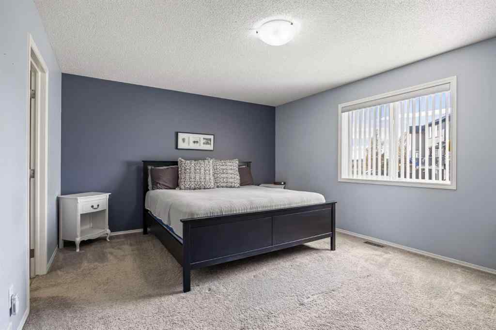 MLS® A2264302 - 303 Westmount Court  in Westridge Okotoks, Residential