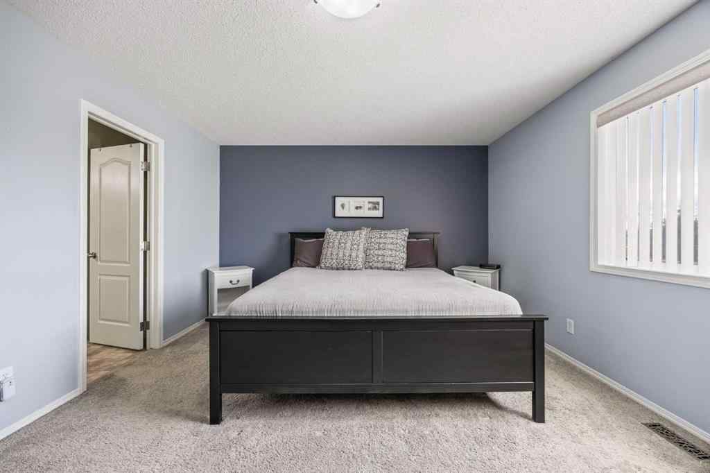 MLS® A2264302 - 303 Westmount Court  in Westridge Okotoks, Residential