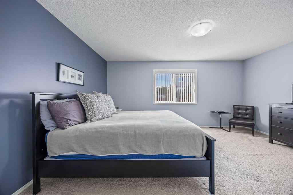 MLS® A2264302 - 303 Westmount Court  in Westridge Okotoks, Residential