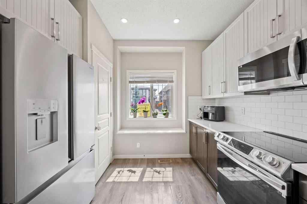 MLS® A2264311 - 336 Marquis Heights SE in Mahogany Calgary, Residential