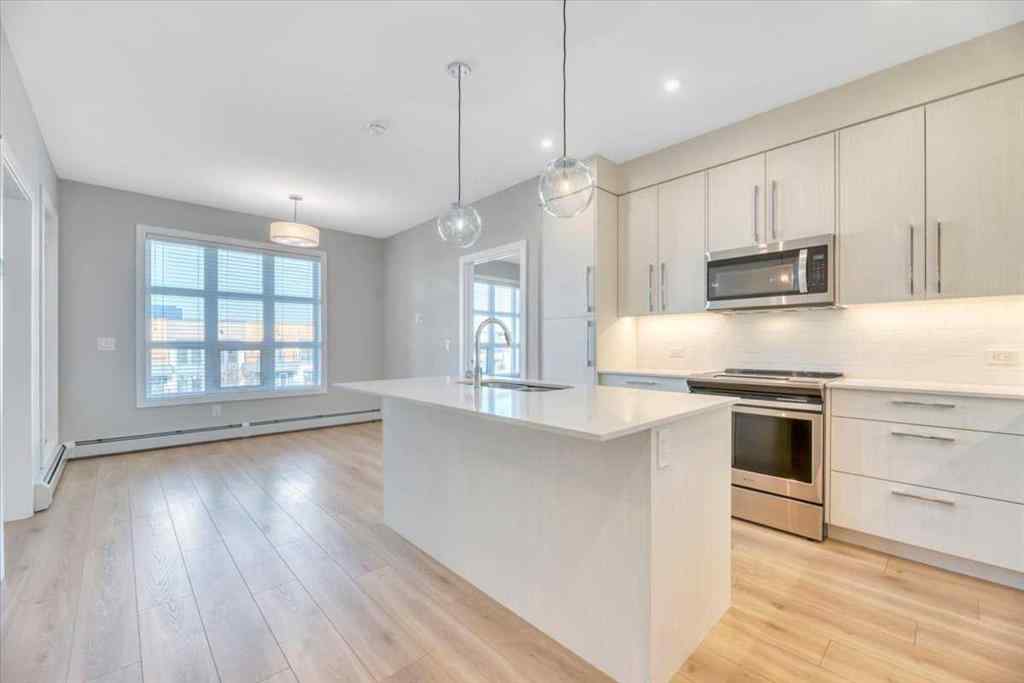 MLS® A2264326 - Unit #311 383 Smith Street NW in University District Calgary, Residential