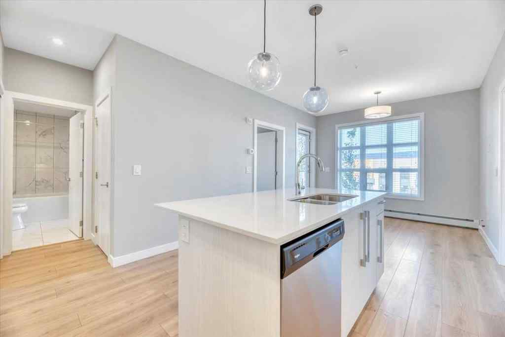 MLS® A2264326 - Unit #311 383 Smith Street NW in University District Calgary, Residential