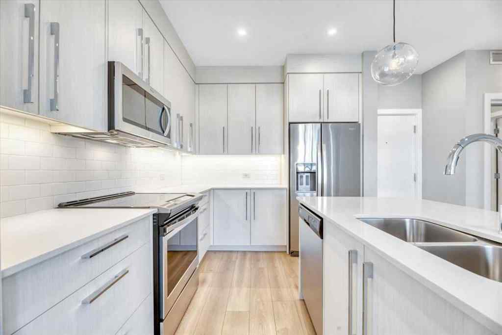 MLS® A2264326 - Unit #311 383 Smith Street NW in University District Calgary, Residential