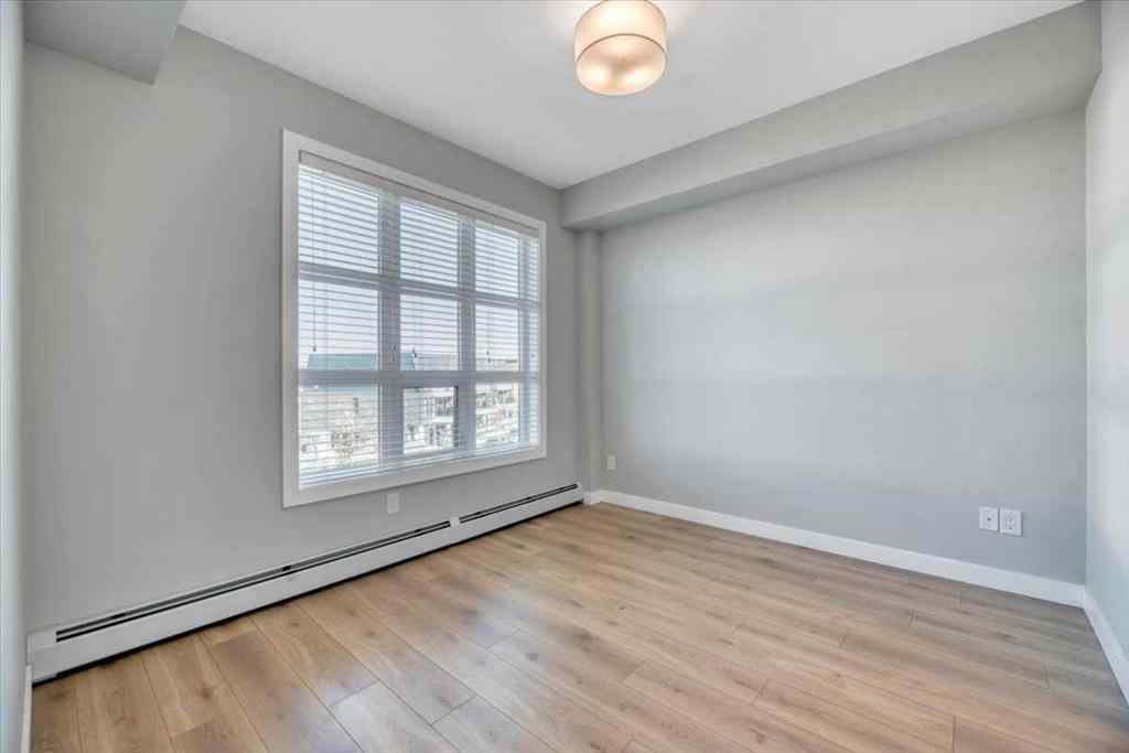 MLS® A2264326 - Unit #311 383 Smith Street NW in University District Calgary, Residential