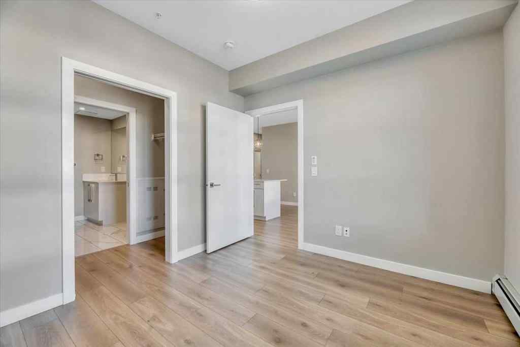 MLS® A2264326 - Unit #311 383 Smith Street NW in University District Calgary, Residential