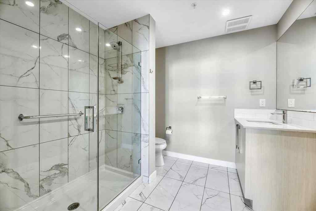 MLS® A2264326 - Unit #311 383 Smith Street NW in University District Calgary, Residential