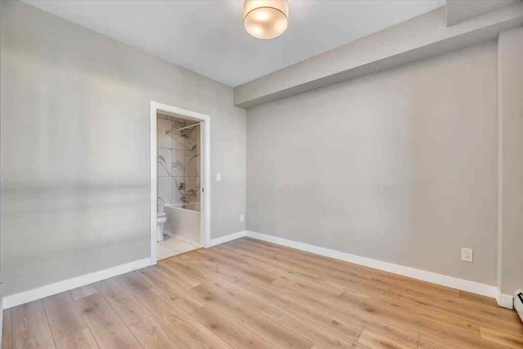 MLS® A2264326 - Unit #311 383 Smith Street NW in University District Calgary, Residential
