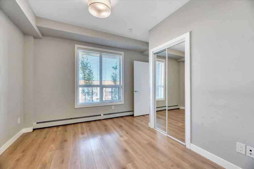 MLS® A2264326 - Unit #311 383 Smith Street NW in University District Calgary, Residential