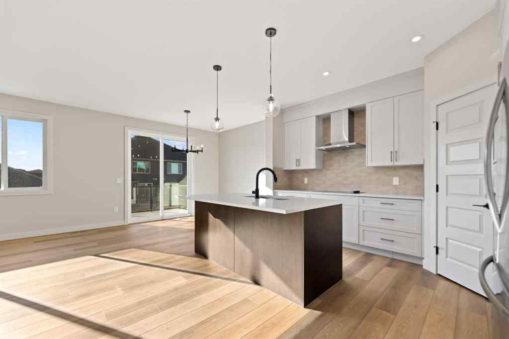 MLS® A2264331 - 86 Emerson Crescent  in Wedderburn Okotoks, Residential