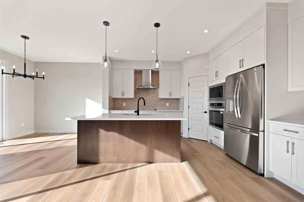 MLS® A2264331 - 86 Emerson Crescent  in Wedderburn Okotoks, Residential