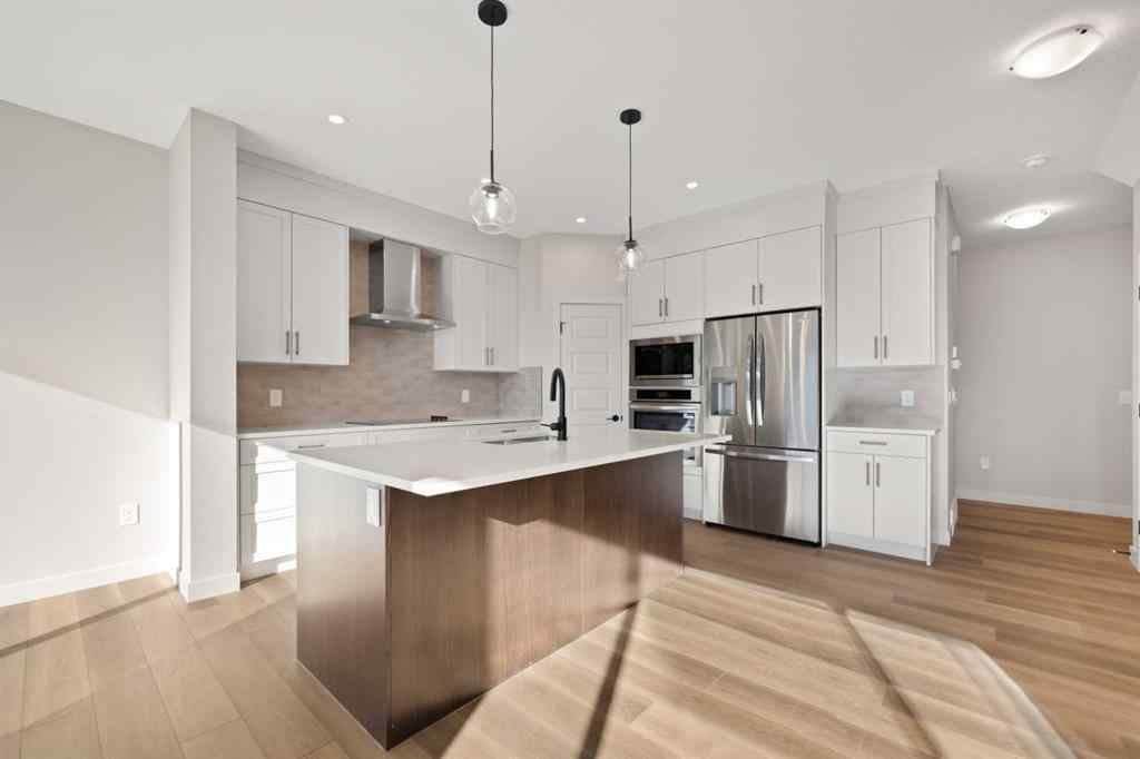 MLS® A2264331 - 86 Emerson Crescent  in Wedderburn Okotoks, Residential