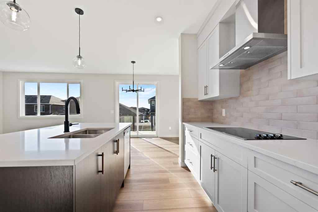 MLS® A2264331 - 86 Emerson Crescent  in Wedderburn Okotoks, Residential