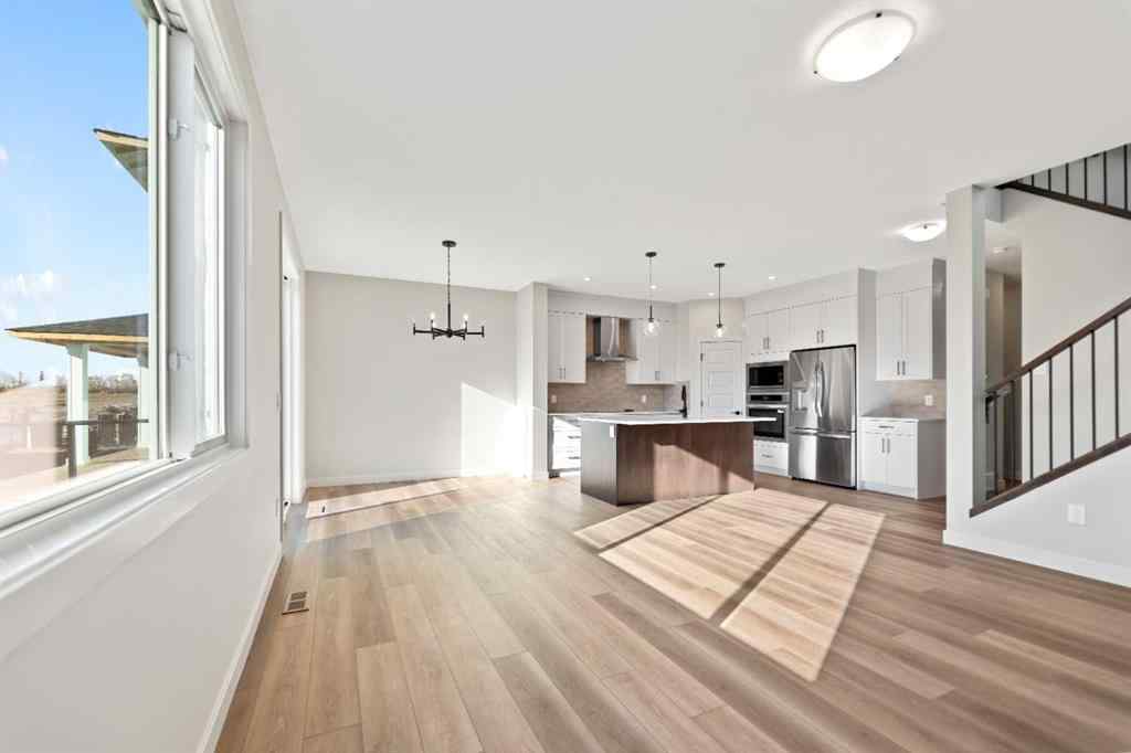 MLS® A2264331 - 86 Emerson Crescent  in Wedderburn Okotoks, Residential