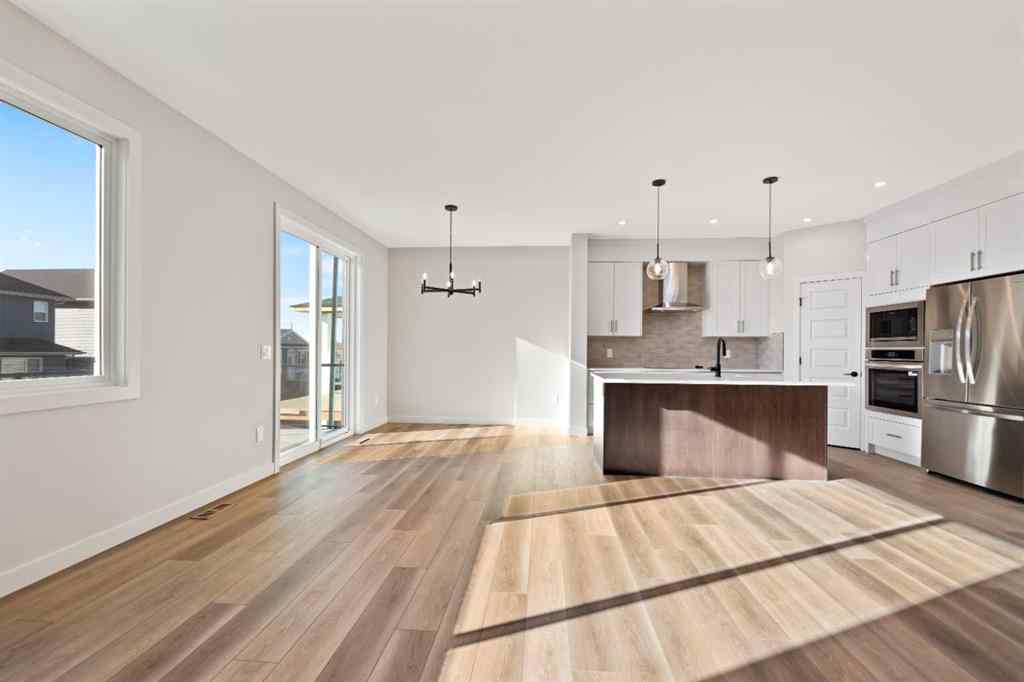 MLS® A2264331 - 86 Emerson Crescent  in Wedderburn Okotoks, Residential