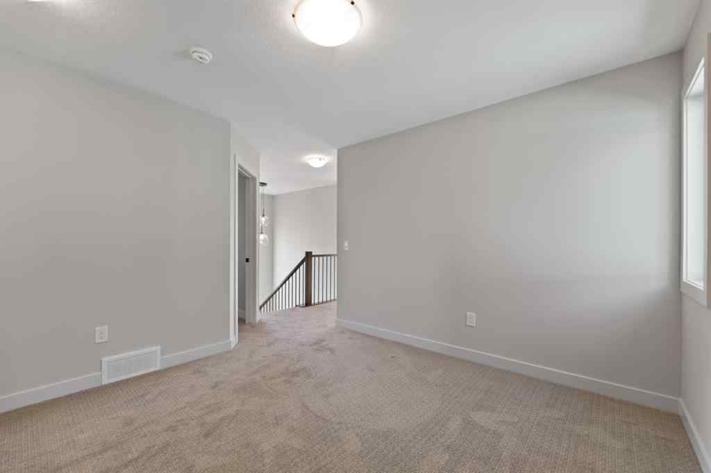 MLS® A2264331 - 86 Emerson Crescent  in Wedderburn Okotoks, Residential