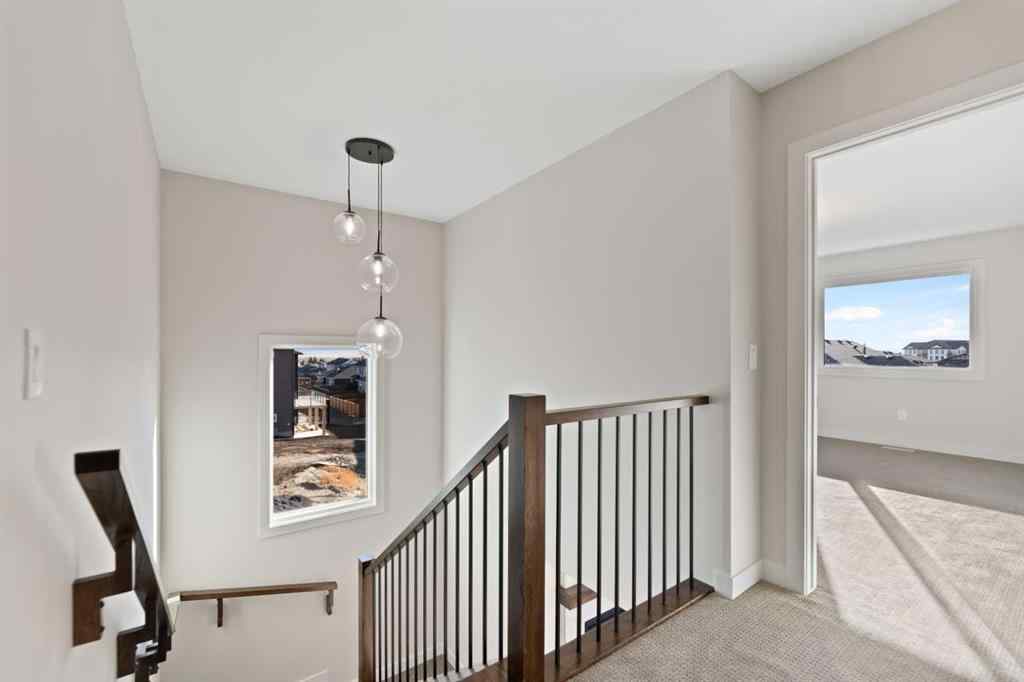 MLS® A2264331 - 86 Emerson Crescent  in Wedderburn Okotoks, Residential