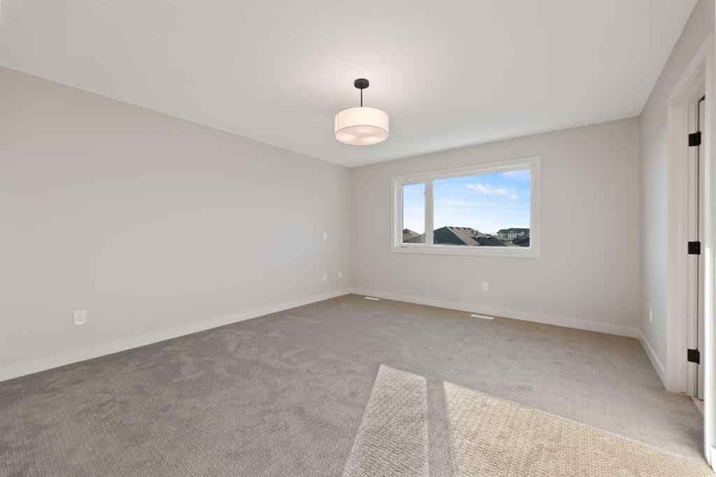 MLS® A2264331 - 86 Emerson Crescent  in Wedderburn Okotoks, Residential