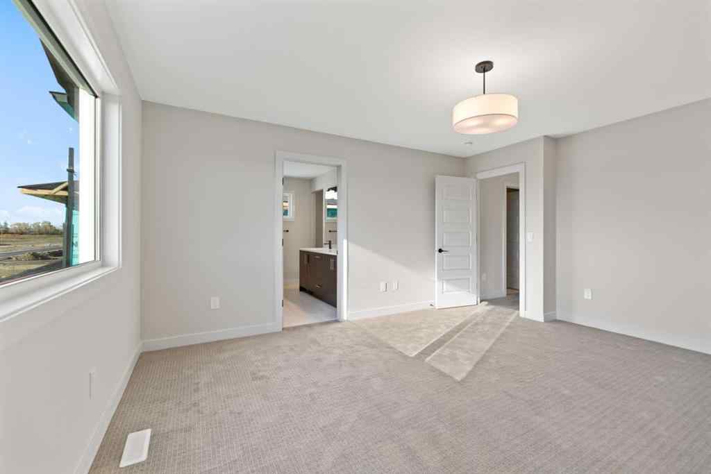 MLS® A2264331 - 86 Emerson Crescent  in Wedderburn Okotoks, Residential