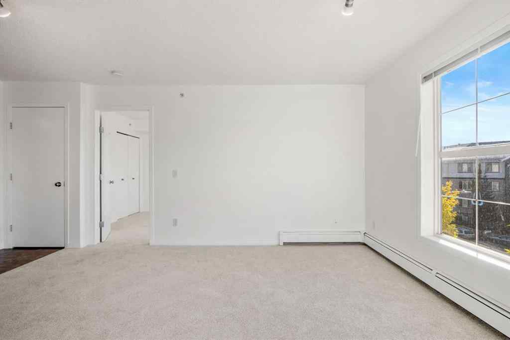 MLS® A2264364 - Unit #416 2000 Applevillage Court SE in Applewood Park Calgary, Residential