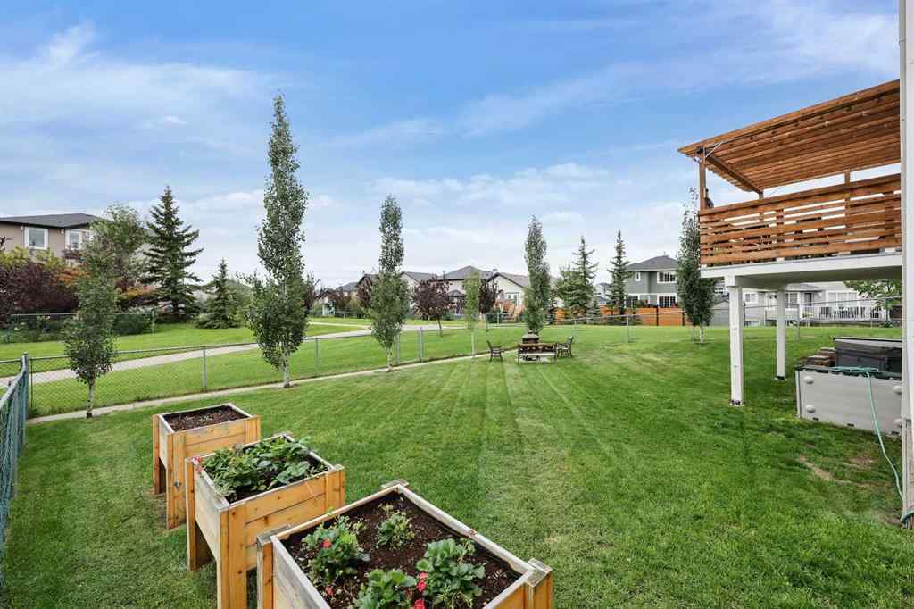 MLS® A2264378 - 60 Canoe Cove SW in Canals Airdrie, Residential