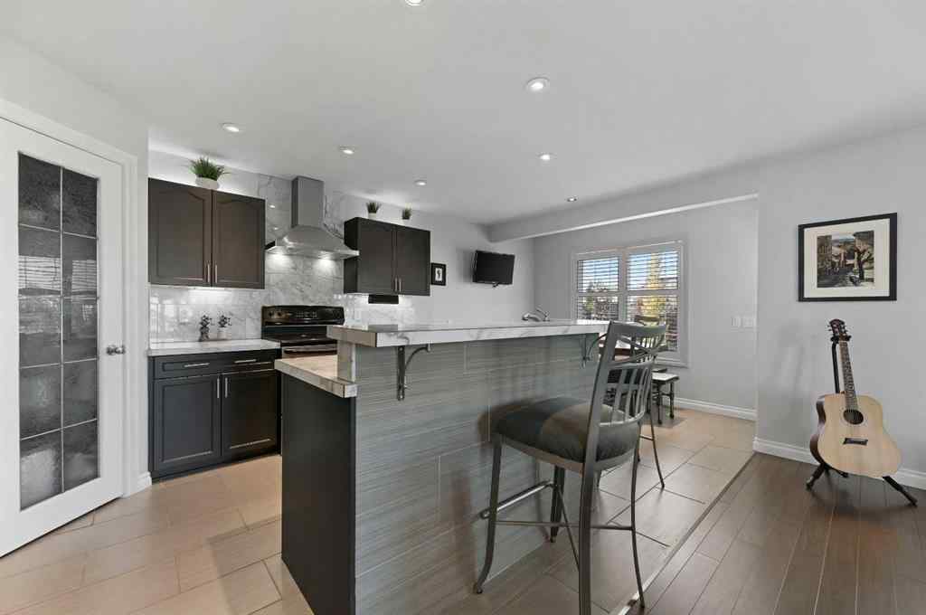 MLS® A2264378 - 60 Canoe Cove SW in Canals Airdrie, Residential