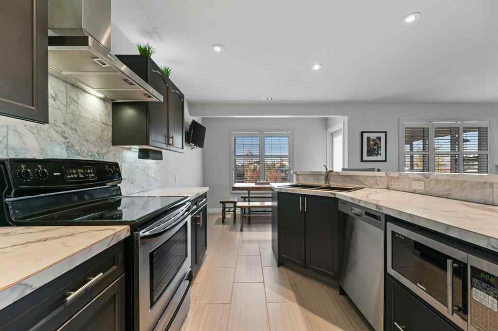 MLS® A2264378 - 60 Canoe Cove SW in Canals Airdrie, Residential