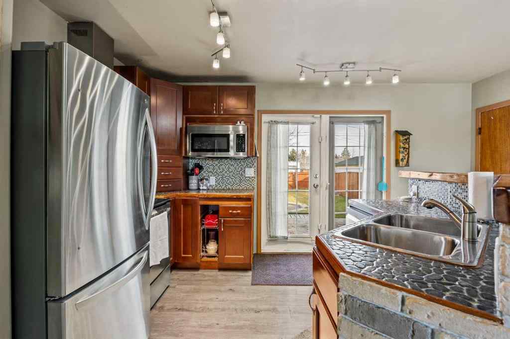 MLS® A2264381 - 1508 49 Street SE in Forest Lawn Calgary, Residential