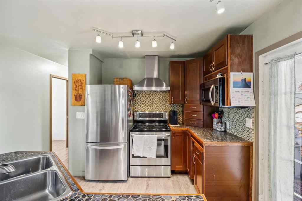 MLS® A2264381 - 1508 49 Street SE in Forest Lawn Calgary, Residential