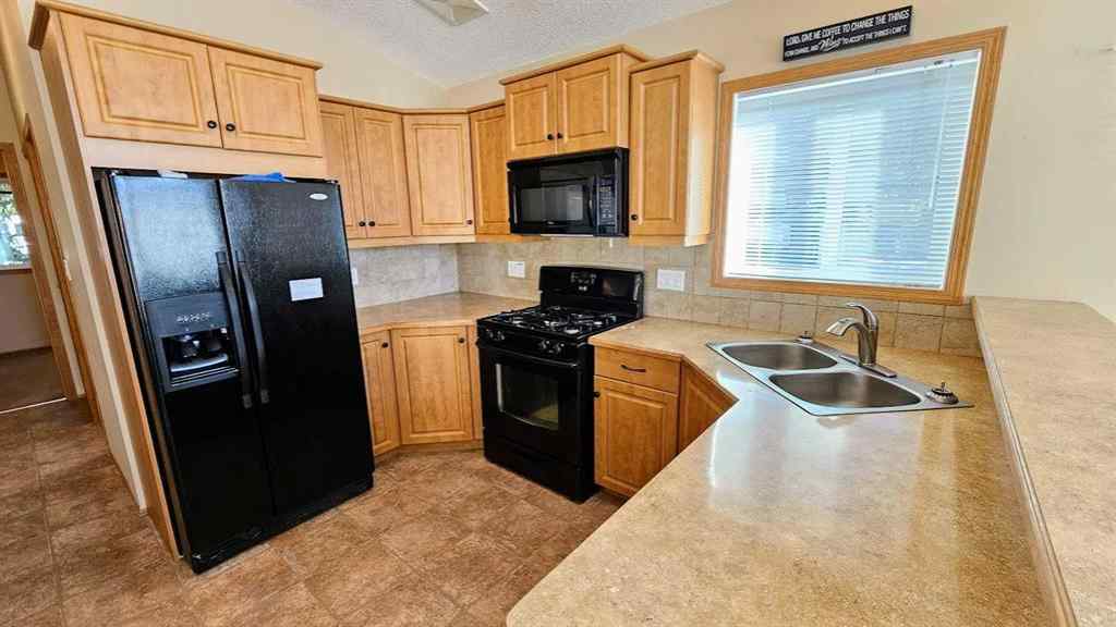 MLS® A2264384 - Unit #28 32351 Range Road 55   in Coyote Creek Rural Mountain View County, Residential